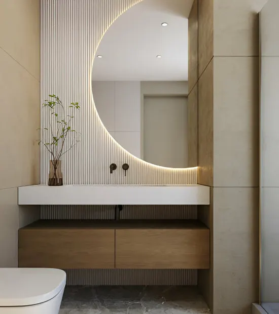 Salle de bain rénovée avec miroir rétroéclairé